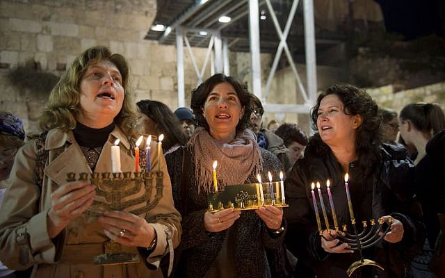 Chairwoman of the Women of the Wall group Anat Hoffman, left, with Meretz MKs Tamar Zandberg, center, and Michal Rozin as they attend a candle lighting ceremony on the 3rd night of the Jewish holiday of Hanukkah, at the Western Wall, in Jerusalem's Old City, December 18, 2014. (Danielle Shitrit/FLASH90) Chairwoman of the Women of the Wall group Anat Hoffman, left, with Meretz MKs Tamar Zandberg, center, and Michal Rozin as they attend a candle lighting ceremony on the 3rd night of the Jewish holiday of Hanukkah, at the Western Wall, in Jerusalem's Old City, December 18, 2014. (Danielle Shitrit/FLASH90)
