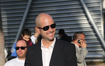 Likud member Amir Ohana arrives to casts his vote at the party's primary elections in Tel Aviv, December 31, 2014. (Flash90)