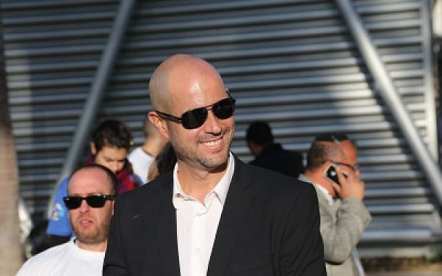 Likud member Amir Ohana arrives to casts his vote at the party's primary elections in Tel Aviv, December 31, 2014. (Flash90)