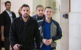 Yitzhak Gabai (right), a member of the extreme-right Lehava organization, at the Jerusalem District Court on November 10, 2015. (Yonatan Sindel/Flash90)