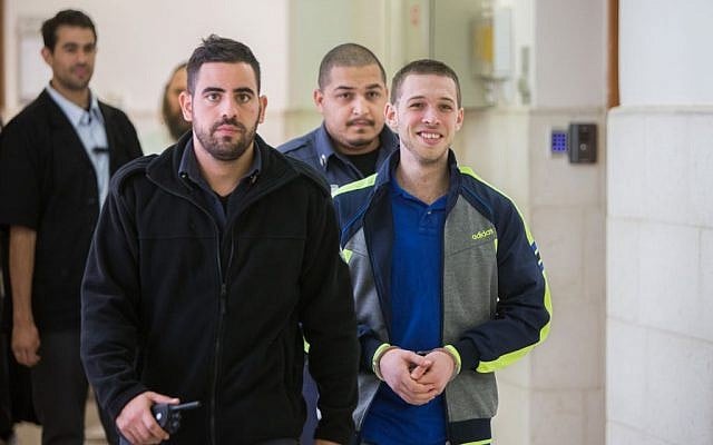 Yitzhak Gabai (right), a member of the extreme-right Lehava organization, at the Jerusalem District Court on November 10, 2015. (Yonatan Sindel/Flash90) Yitzhak Gabai (right), a member of the extreme-right Lehava organization, at the Jerusalem District Court on November 10, 2015. (Yonatan Sindel/Flash90)