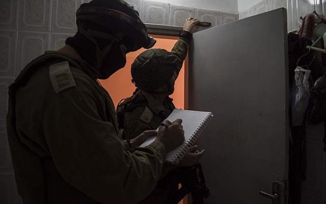 Illustrative. IDF soldiers measure the home of a terrorist in preparation for the building's demolition, on November 28, 2015. (IDF Spokesperson's Unit) Illustrative. IDF soldiers measure the home of a terrorist in preparation for the building's demolition, on November 28, 2015. (IDF Spokesperson's Unit)