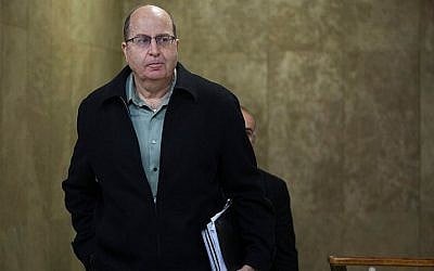 Defense Minister Moshe Ya'alon arrives at the Prime Minister's Office in Jerusalem, on December 13, 2015. (Yonatan Sindel/Flash90)