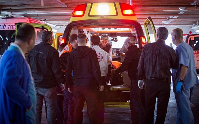 Wounded Israelis are evacuated to emergency at Shaarei Tzedek hospital in Jerusalem, after a Palestinian driver rammed his car into a bus stop injuring 14 people, December 14, 2015. (Hadas Parush/Flash90 Wounded Israelis are evacuated to emergency at Shaarei Tzedek hospital in Jerusalem, after a Palestinian driver rammed his car into a bus stop injuring 14 people, December 14, 2015. (Hadas Parush/Flash90