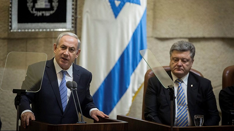 Prime Minister Benjamin Netanyahu speaks during a special plenary session held in honor of visiting Ukrainian President Petro Poroshenko (R) at the Knesset, Jerusalem, on December 23, 2015. (Flash90/Hadas Parush) Prime Minister Benjamin Netanyahu speaks during a special plenary session held in honor of visiting Ukrainian President Petro Poroshenko (R) at the Knesset, Jerusalem, on December 23, 2015. (Flash90/Hadas Parush)