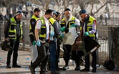 Paramedics at the scene where two Palestinian stabbed three Israelis at the Old City's Jaffa Gate in Jerusalem on December 23, 2015. (Yonatan Sindel/Flash90)