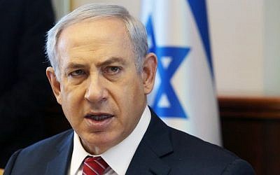 Prime Minister Benjamin Netanyahu speaks during the weekly cabinet meeting in Jerusalem on December 27, 2015. (Marc Israel Sellem/Pool)