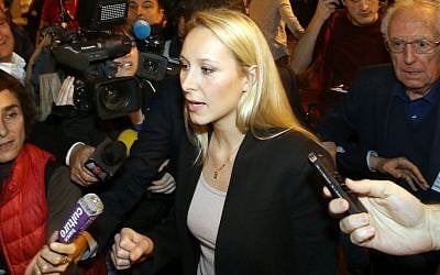 Far right National Front party regional leader for southeastern France, Marion Marechal-Le Pen, at a meeting with supporters, in Carpentras, southern France, December 6, 2015. (AP Photo/Claude Paris)