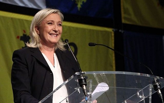 French far-right National Front Party leader, Marine Le Pen, delivers a speech after the first round of regional elections, Sunday, Dec. 6, 2015, in Henin-Beaumont, northern France. (AP Photo/Michel Spingler) French far-right National Front Party leader, Marine Le Pen, delivers a speech after the first round of regional elections, Sunday, Dec. 6, 2015, in Henin-Beaumont, northern France. (AP Photo/Michel Spingler)