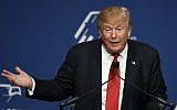 In this Dec. 3, 2015, photo, Republican presidential candidate Donald Trump speaks at the Republican Jewish Coalition Presidential Forum in Washington. (AP Photo/Susan Walsh)