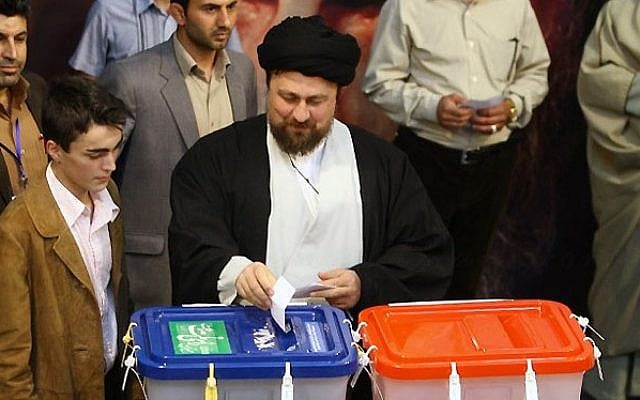 Hassan Khomeini casts his ballot in the 2013 Iranian elections. (CC BY-sayyed shahab-o-din vajedi via Wikimedia Commons) Hassan Khomeini casts his ballot in the 2013 Iranian elections. (CC BY-sayyed shahab-o-din vajedi via Wikimedia Commons)