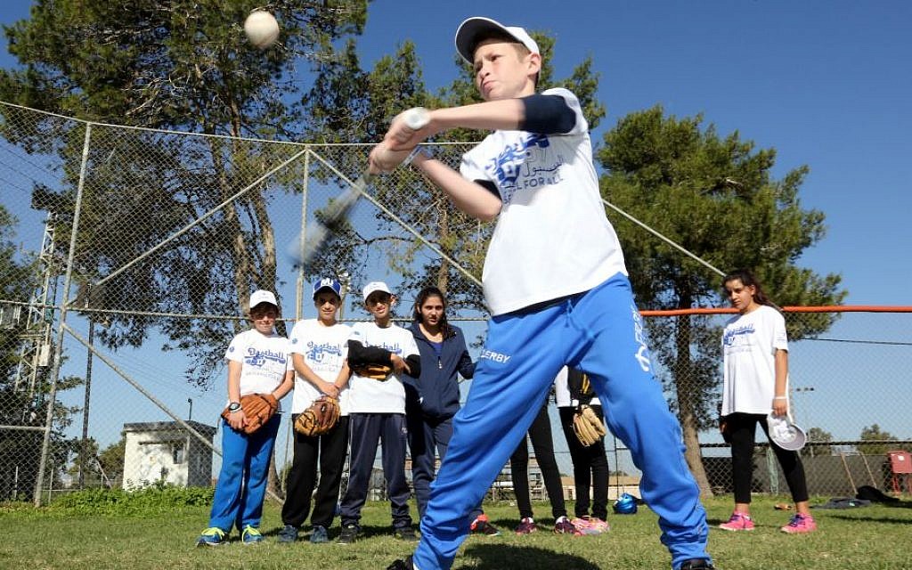 Up to bat in Baseball for All, an Israeli coexistence program (Courtesy Association of Baseball in Israel) Up to bat in Baseball for All, an Israeli coexistence program (Courtesy Association of Baseball in Israel)