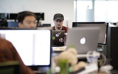 Brian Wallace, a security researcher at Cylance, works on his computer in Irvine, Calif. on October 21, 2015. (AP Photo/Jae C. Hong) Brian Wallace, a security researcher at Cylance, works on his computer in Irvine, Calif. on October 21, 2015. (AP Photo/Jae C. Hong)