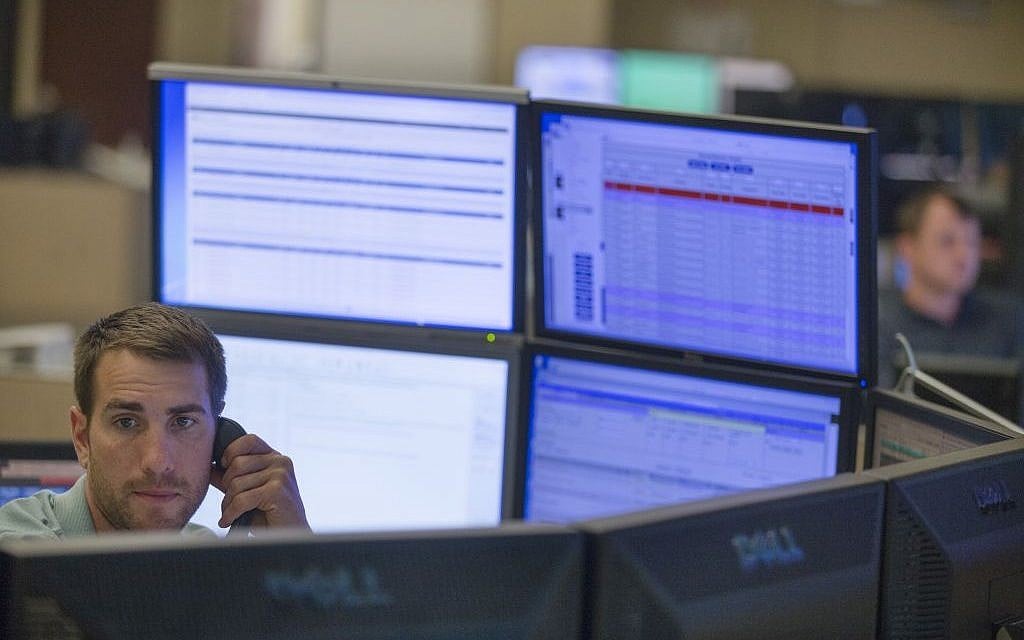 System control center operator Jack Martin works at an AEP Transmission Operations Center in New Albany, Ohio on May 20, 2015. (AP Photo/John Minchillo) System control center operator Jack Martin works at an AEP Transmission Operations Center in New Albany, Ohio on May 20, 2015. (AP Photo/John Minchillo)