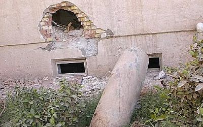 A 2,000-pound live bomb outside the headquarters of the Mukhabarat, Saddam Hussein's secret police, on May 6, 2003, Baghdad, Iraq. (Courtesy: Harold Rhode)