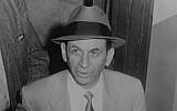 Meyer Lansky at a New York City police station, where he is being booked for vagrancy, 1958 (Wikimedia Commons/JTA)