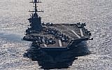 In this Friday, Dec. 25, 2015 photo released by the US Navy, the aircraft carrier USS Harry S. Truman navigates the Gulf of Oman. (Mass Communication Specialist 3rd Class J. M. Tolbert/ US Navy via AP)