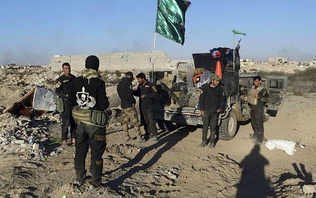 Iraqi security forces enter the heavily damaged Huz neighborhood in downtown Ramadi, 70 miles (115 kilometers) west of Baghdad, Iraq, Saturday, Dec. 26, 2015. (AP Photo/Osama Sami) Iraqi security forces enter the heavily damaged Huz neighborhood in downtown Ramadi, 70 miles (115 kilometers) west of Baghdad, Iraq, Saturday, Dec. 26, 2015. (AP Photo/Osama Sami)