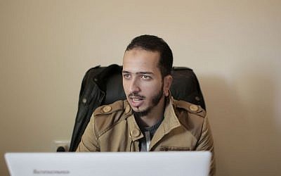 Mohammed Qudih, 25, speaks to an Associated Press reporter during an interview in his office in Gaza City on November 16, 2015. (Khalil Hamra/AP Photo) 