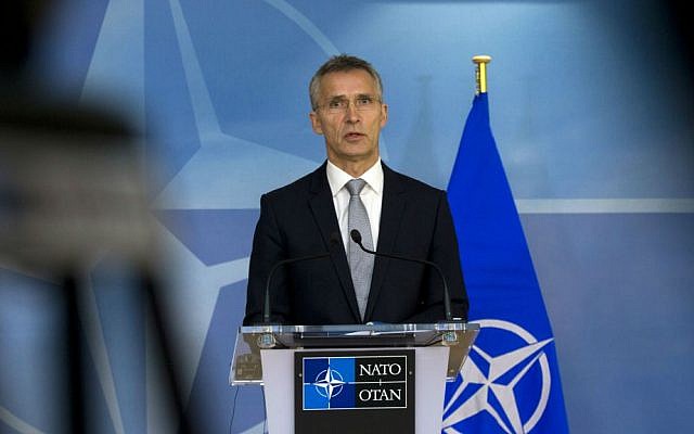 NATO Secretary General Jens Stoltenberg addresses a media conference at NATO headquarters in Brussels on Monday, Nov. 30, 2015, after meeting Turkish Prime Minister Ahmet Davutoglu to discuss a Russian warplane downed by a Turkish fighter jet at the border with Syria. (AP Photo/Virginia Mayo)
