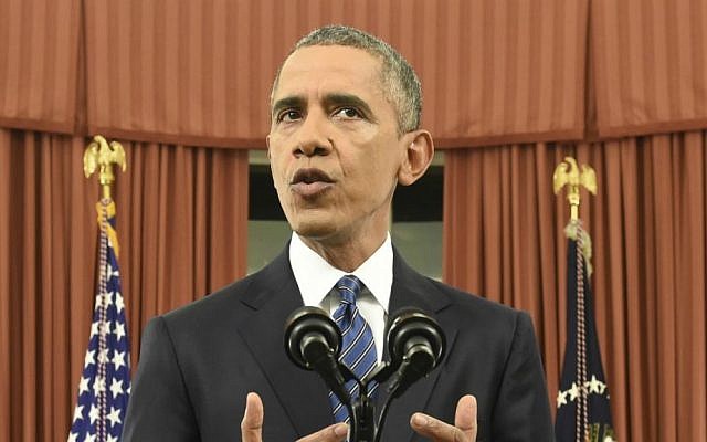 President Barack Obama addresses the nation from the Oval Office at the White House in Washington, Sunday night, Dec. 6, 2016. (Saul Loeb/Pool Photo via AP)