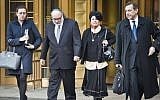 Jonathan Pollard, second from left, leaves federal court Monday, Dec. 14, 2015, in New York. (AP/Bebeto Matthews)