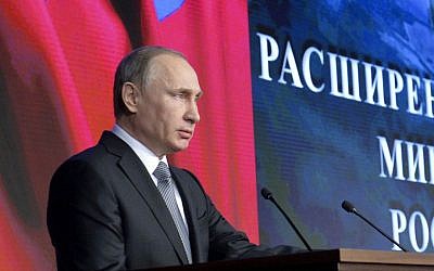 Russian President Vladimir Putin at a meeting with top military officials in Moscow, Russia, Friday, Dec. 11, 2015. (Alexei Druzhinin/Sputnik, Kremlin Pool Photo via AP) Russian President Vladimir Putin at a meeting with top military officials in Moscow, Russia, Friday, Dec. 11, 2015. (Alexei Druzhinin/Sputnik, Kremlin Pool Photo via AP)