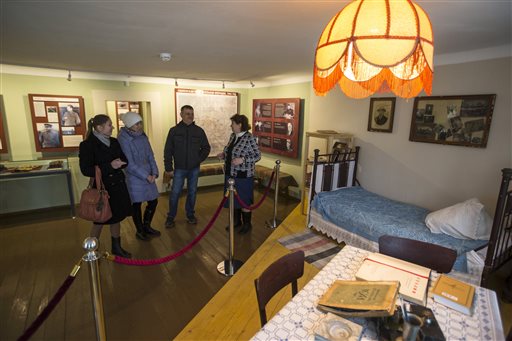 In this Wednesday, Dec. 9, 2015 photo, the director of the Stalin museum, Lydia Kozlova, right, speaks to visitors, in the museum in the village of Khoroshevo, west of Moscow, Russia. The Stalin museum was opened this year in this small village where the Soviet leader is said to have stayed the night on his only visit to the front during World War II. (AP Photo/Pavel Golovkin) In this Wednesday, Dec. 9, 2015 photo, the director of the Stalin museum, Lydia Kozlova, right, speaks to visitors, in the museum in the village of Khoroshevo, west of Moscow, Russia. The Stalin museum was opened this year in this small village where the Soviet leader is said to have stayed the night on his only visit to the front during World War II. (AP Photo/Pavel Golovkin)