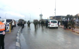 IDF troops, police and paramedics at the scene of an attempted stabbing at the Gush Etzion Junction on December 1, 2015 (Magen David Adom)
