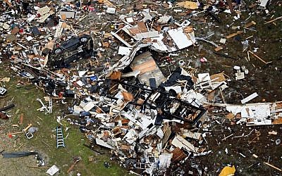 Debris of homes spread out after Saturday's tornado in Garland, Texas, Sunday, Dec. 27, 2015. (Photo by G.J. McCarthy/The Dallas Morning News via AP) 