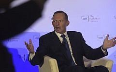 Former Australian prime minister Tony Abbott responds during a question and answer session after delivering a lecture at the Fullerton Hotel in Singapore on December 9, 2015 (Photo by AP Photo/Joseph Nair)