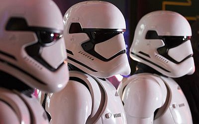 Fans wearing Storm Trooper costumes ahead of the first public screening of “Star Wars: The Force Awakens” at TOHO Cinemas in Tokyo, Japan, Dec. 18, 2015. (Tomohiro Ohsumi/Bloomberg/Getty Images/JTA)