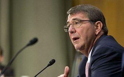 Defense Secretary Ash Carter, accompanied by Joints Chiefs Vice Chairman Gen. Paul Selva, testifies on Capitol Hill in Washington, Wednesday, Dec. 9, 2015, before the Senate Armed Service Committee. Carter said the U.S. is prepared to assist the Iraqi army with more personnel and equipment to help them fight Islamic State militants. (AP Photo/Pablo Martinez Monsivais) 