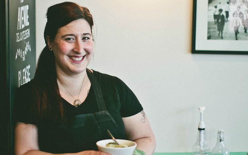Illustrative: Laura Frangiosa, owner of The Avenue Delicatessen in suburban Philadelphia, holding her signature Jewish wedding soup. (Neal Santos/via JTA) Illustrative: Laura Frangiosa, owner of The Avenue Delicatessen in suburban Philadelphia, holding her signature Jewish wedding soup. (Neal Santos/via JTA)