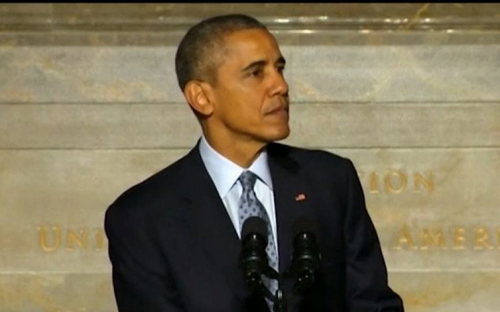 US President Barack Obama speaking to 31 new US residents during the naturalization ceremony at the National Archive in Washington DC, on December 15 2015. (Screen capture)