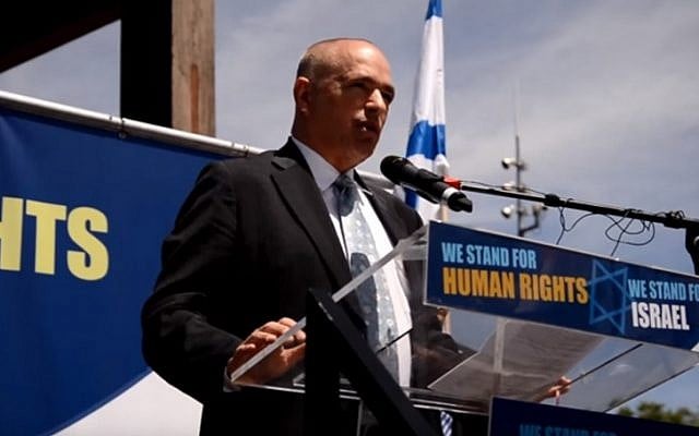 Israeli Ambassador to Switzerland Yigal Caspi speaks at a pro-Israel rally in Geneva in July 2015, during the conflict with Hamas in Gaza. (screen capture: YouTube) Israeli Ambassador to Switzerland Yigal Caspi speaks at a pro-Israel rally in Geneva in July 2015, during the conflict with Hamas in Gaza. (screen capture: YouTube)