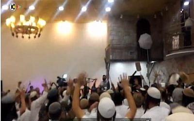 Far-right Israeli wedding-goers celebrate the killings of the Dawabsha family (screen capture: Channel 10)