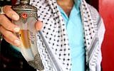 Image showing 'Dagger' perfume for sale in the Gaza Strip (screen capture: YouTube)