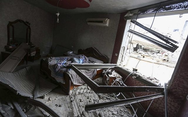 Netanyahu believes demolition of terrorists' families' homes to be a deterrent. Pictured: Palestinians inspecting the home of Mohammed Abu Shahin, reportedly demolished by Israeli troops in the Qalandia refugee camp, near the west bank city of Ramallah, on November 16, 2015. Shahin was accused of killing an Israeli hiker in June 2015. Photo by Flash90 The home of Mohammed Abu Shahin, reportedly demolished by Israeli troops in the Qalandia refugee camp, near Ramallah, on November 16, 2015. Shahin was accused of killing an Israeli hiker in June 2015. (Flash90)
