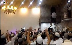 File: Far-right Israeli wedding-goers celebrate the killings of the Dawabsha family, brandishing rifles and calling for revenge against Palestinians, December 2015. (screen capture: Channel 10)