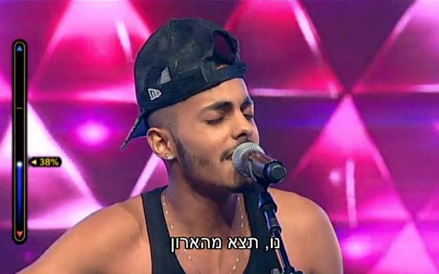 Maor Gamliel sings "Leave the closet" on the reality TV show "The Next Star for Eurovision 2016," December 25, 2015. (Screen Capture/Keshet/Channel 2) Maor Gamliel sings "Leave the closet" on the reality TV show "The Next Star for Eurovision 2016," December 25, 2015. (Screen Capture/Keshet/Channel 2)