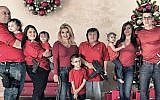 Nevada Assemblywoman Michele Fiore and family pose for Christmas card holding guns, December 1, 2015 (Facebook)