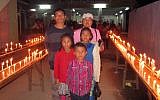 Members of the Bnei Menashe Jewish community celebrating Hanukkah in Churachandpur on December 8, 2015. (Shavei Israel)