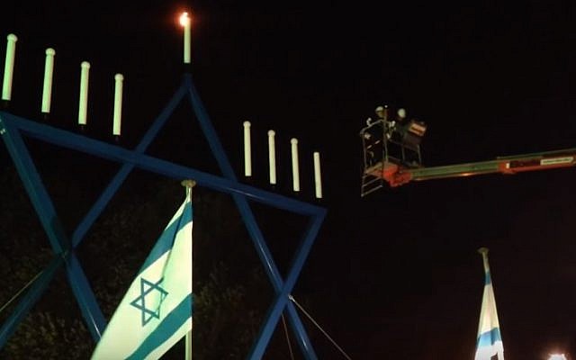 Dutch chief rabbi Binyomin Jacobs lights a giant menorah in Maastricht, the Netherlands, in 2013 (YouTube screen capture) Dutch chief rabbi Binyomin Jacobs lights a giant menorah in Maastricht, the Netherlands, in 2013 (YouTube screen capture)