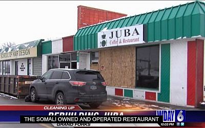 Juba Cafe in Grand Forks, North Dakota, the target of suspected racist graffiti and firebombing, December 2015. (screen capture: WDAZ broadcast)
