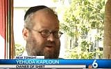 Rabbi Yehuda Kaploun speaks to the media about responding to the 9/11 World Trade Center attack in New York. (YouTube screenshot)