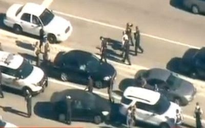 Security forces at the scene of the shooting in California on December 2, 2015 (screen capture: CNN) 