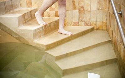 Illustrative: Male use of the mikvah is not new. Many dunk ahead of weddings, feast days, and even Shabbat. (Courtesy of Mayyim Hayyim/via JTA)