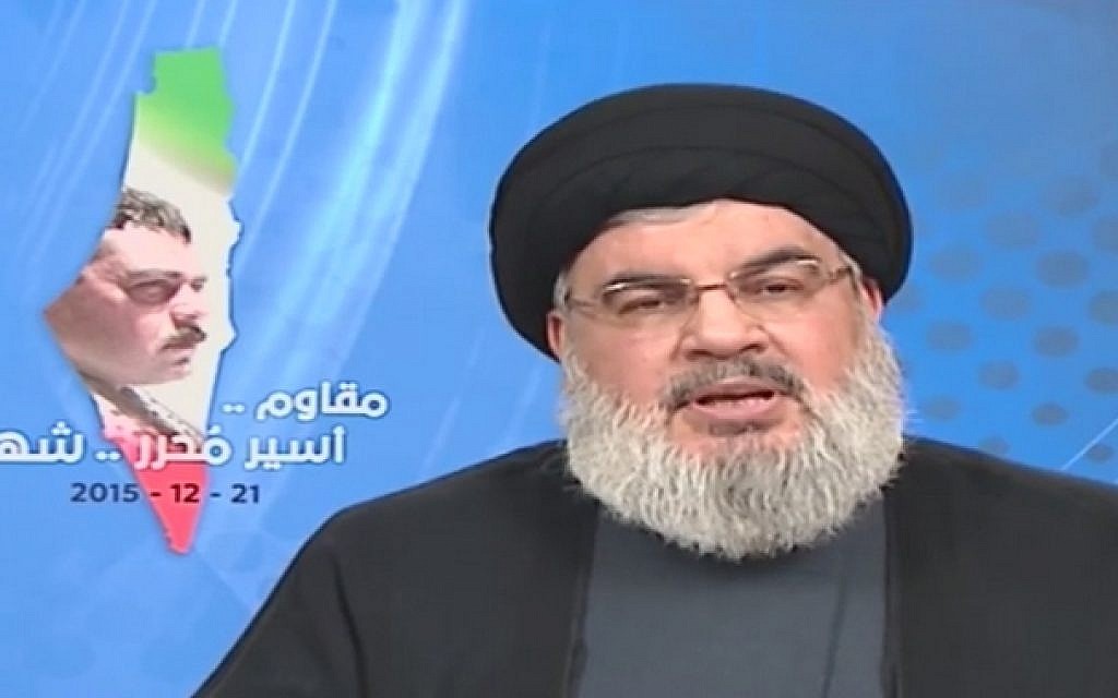 Hezbollah leader Hassan Nasrallah discusses the death of terrorist Samir Kuntar, allegedly at the hands of Israel, in a televised speech from Beirut on December 21, 2015. (screen capture: YouTube)