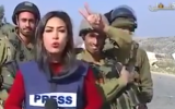 IDF Soldiers interrupt Palestinian Authority TV reporter in the West Bank town of Abud (YouTube screen capture)